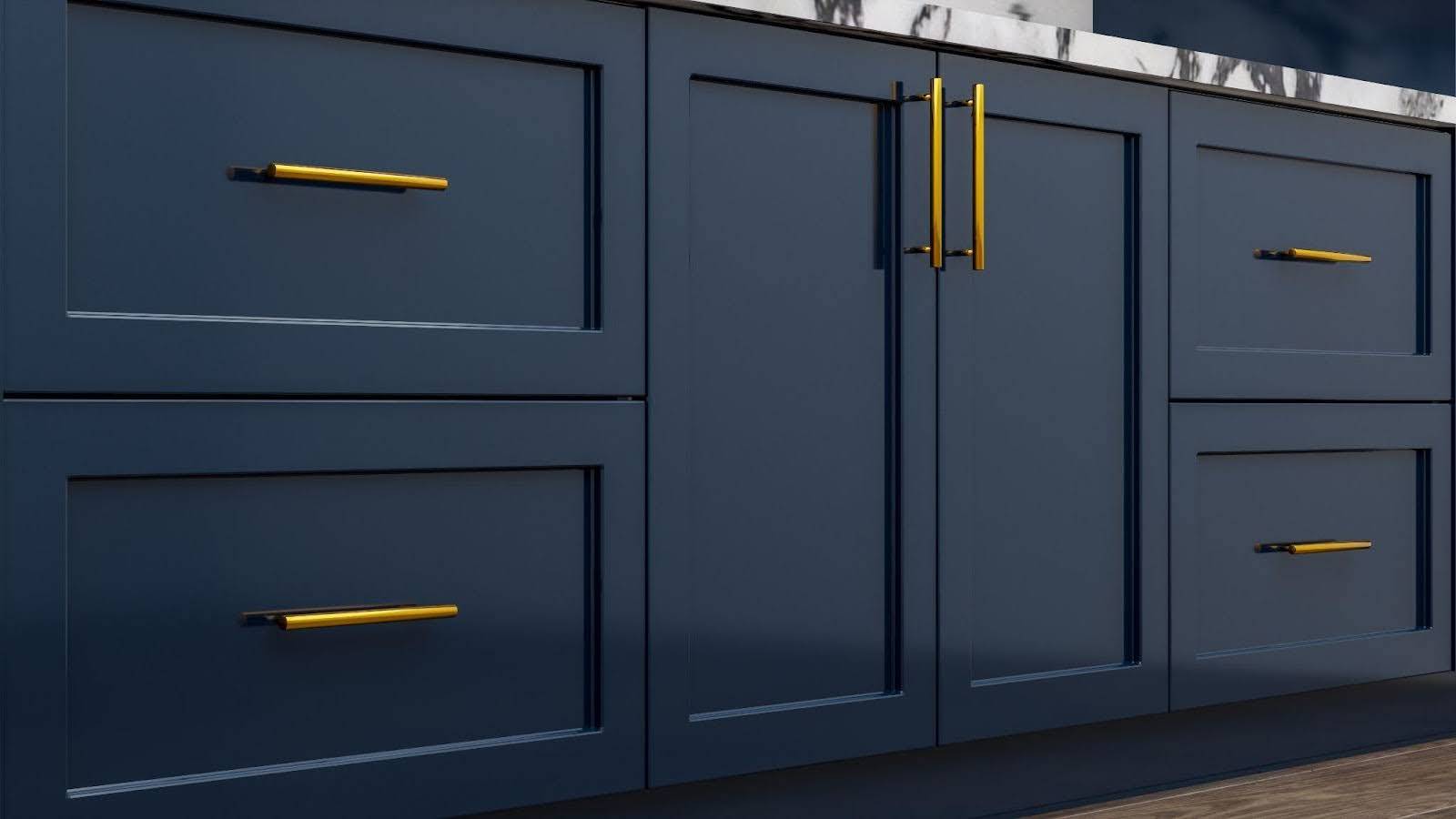 A modern kitchen featuring blue cabinets with elegant gold handles