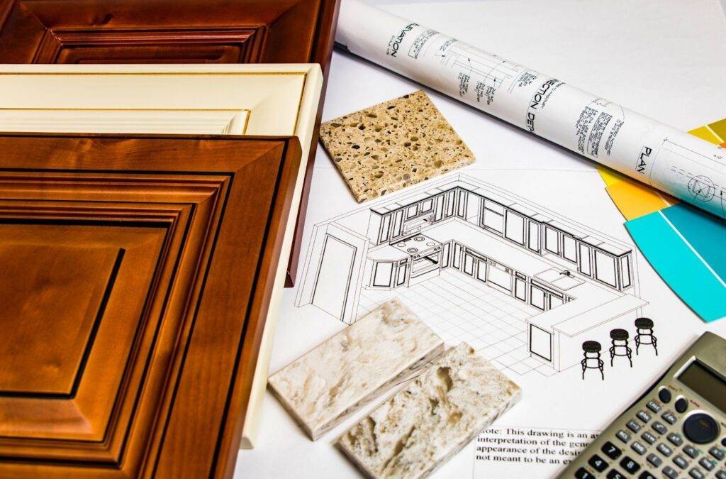 Kitchen cabinet design and construction process displayed featuring tools and materials in a professional setting